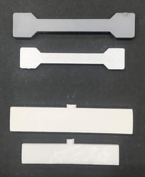 写真：粉末射出成形で作製した成形体と焼結体の写真